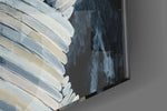 Abstract panel catching low light to reveal its tonal contrast