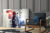 Digital Astronaut artwork anchoring a wall with bold sci-fi palette