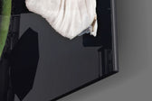 Flower panel catching low light to reveal its tonal patina