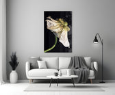 Flower glass wall art styled above a credenza in a living room