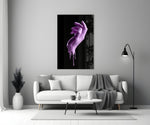 Hand glass wall art styled above a vanity in a bedroom