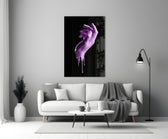Hand glass wall art styled above a vanity in a bedroom