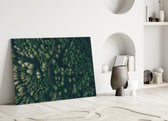 Forest glass wall art styled above a credenza in a living room