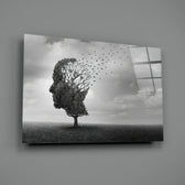 Autumn of Thoughts close-up showing head-shaped tree with leaves becoming birds