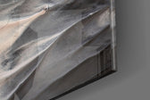 Abstract panel catching window light to reveal its tonal softness