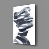 Man close-up showing portrait dissolving into ribbon distortion