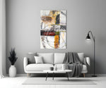 Abstract glass wall art styled above a console in a hallway