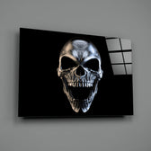 Skull close-up showing chrome-polished bone and cast shadow