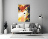 Women's glass wall art styled above a credenza in a bedroom