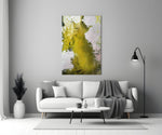 Colors of Abstraction glass wall art styled in a living room