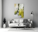 Colors of Abstraction glass wall art styled above a credenza in a hallway