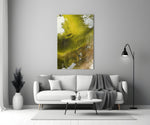 Colors of Abstraction glass wall art styled in a living room