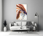 Abstract glass wall art styled above a credenza in a living room