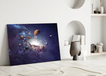 Planets glass wall art styled above a credenza in a kids room