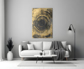 Abstract Loop glass wall art styled above a sofa in a living room