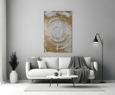 Abstract Loop glass wall art styled above a credenza in a living room