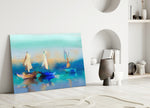 Sailboat glass wall art styled above a console in a living room
