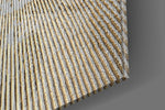 Abstract Loop panel catching window light to reveal its luminous calm