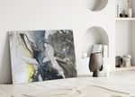 Marble glass wall art styled above a sofa in a living room