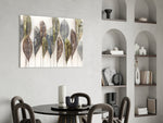 Feathers glass print enhancing a dining room with cinematic warmth