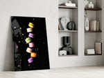 Macarons artwork anchoring a wall with playful culinary palette