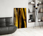 Yellow Story glass print enhancing a dining room with cinematic drama
