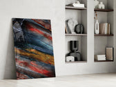 Abstract artwork anchoring a wall with bold mineral palette