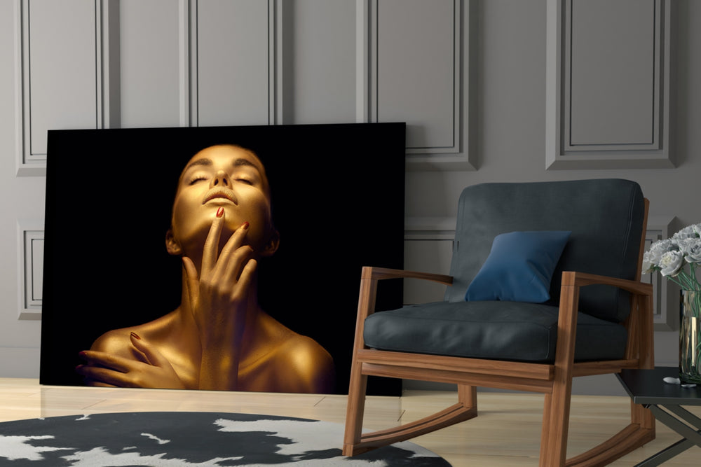 Gold Woman artwork anchoring a wall with bold luxe palette