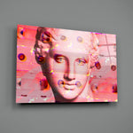 Sculpture close-up showing pearl bust glitched through neon-pink and amber spheres