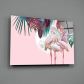 Flamingo close-up showing three flamingos before chalk moon framed by tropical leaves