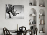 Black Rhino glass print enhancing a study with cinematic drama
