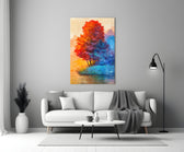 Red Tree glass wall art styled above a console in a living room