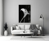 Flower glass wall art styled above a credenza in a bedroom