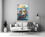 Sailboat glass wall art styled above a console in a living room