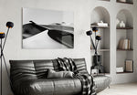 Black Landscape panel adding editorial calm to a bedroom