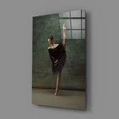 Ballerina close-up showing black-tutu dancer arched in teal smoke