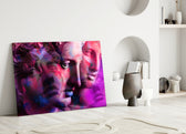 Statues glass wall art styled above a sofa in a gaming room