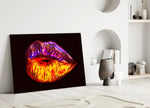 Lip glass wall art styled above a credenza in a bedroom