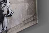 Curiosity artwork anchoring a wall with witty urban palette
