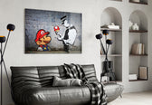 Super Mario glass wall art styled above a console in a gaming room