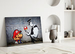 Super Mario close-up showing pixel Mario and stenciled constable with red mushroom