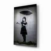 Escape from the Rain glass wall art displayed beside a charcoal linen armchair in a soft-gray hallway with herringbone floor and brass picture light