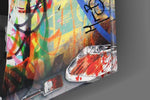 Einstein's Answer artwork anchoring a wall with bold energetic palette