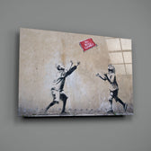 Banksy-style stencil panel bringing mischievous warmth to a contemporary lounge