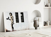 Neanderthal close-up showing stenciled caveman holding fast-food tray with burger and shake