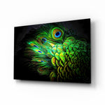 Peacock glass wall art displayed above a charcoal velvet bed in a moody slate bedroom with brushed-brass sconces and emerald velvet bench