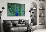 Peacock glass wall art styled above a sideboard in a dining room