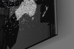 World Map artwork anchoring a wall with dark sophisticated palette