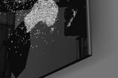 World Map artwork anchoring a wall with dark sophisticated palette