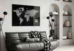 World Map glass wall art styled above a desk in an office